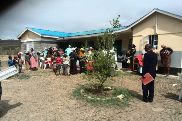 Community gathered at the Health Center for the project handover